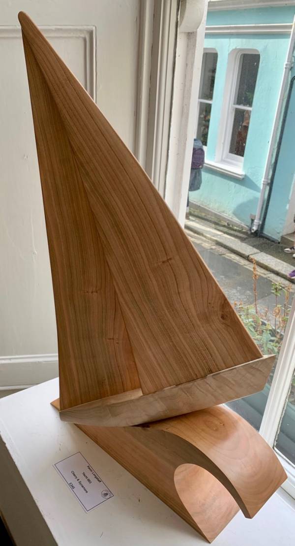 - a , wood Sculpture by Kevin Longstaff, measuring 60 x 39 cm (H x W) £345